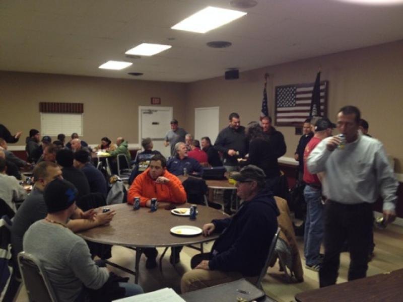 Officers at the head table of a Local 94 meeting