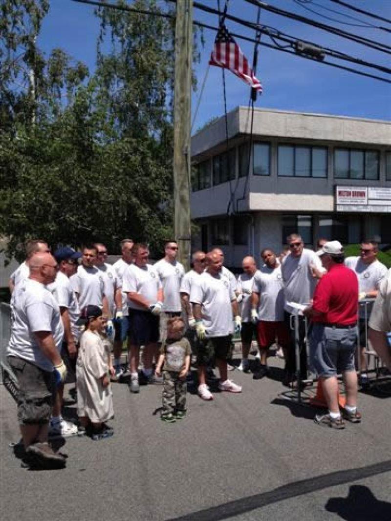 Local 94 members pulling a tank at the Knights of Columbus tank pull